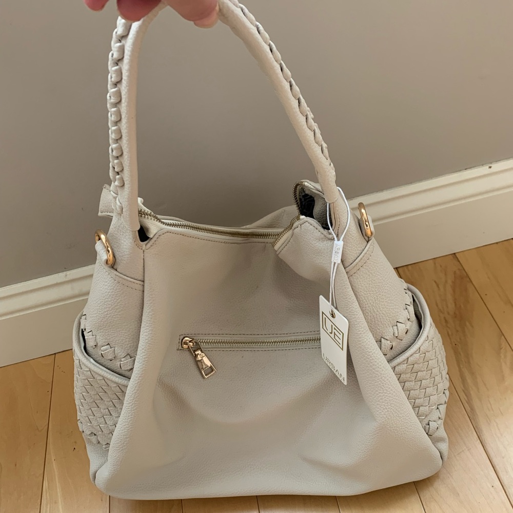Cream brand new women’s handbag urban expressions